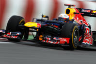 MONTREAL, CANADA - JUNE 08: Sebastian Vettel of Germany and Red Bull Racing drives during practice for the Canadian Formula One Grand Prix at the Circuit Gilles Villeneuve on June 8, 2012 in Montreal, Canada. (Photo by Paul Gilham/Getty Images)