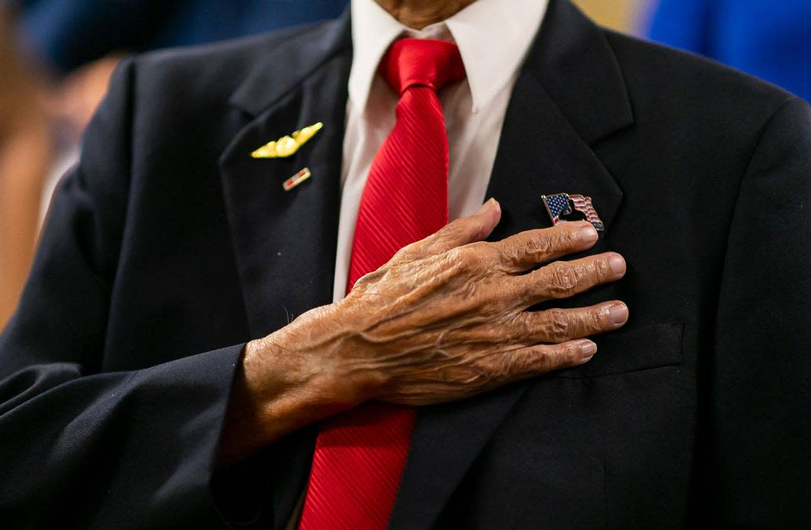 U.S. Army veteran Richard Goon, 98, recites the Pledge of Allegiance during a virtual ceremony where he was award the Congressional Gold Medal at the Grand Villa Senior Living Community on Tuesday, July 5, 2022 in Deerfield Beach, Fla. During his service, Goon trained as a cryptographer and eventually was stationed along the Chinese and Indochina border where he assisted American pilots and the Chinese army to fight Japanese forces.