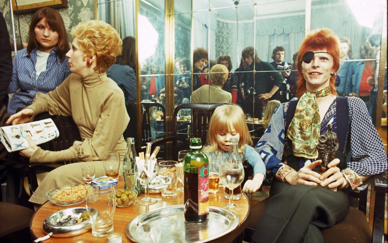 Angie Bowie, Zowie Bowie (Duncan Jones) and David Bowie in 1974 - 1974 Gijsbert Hanekroot