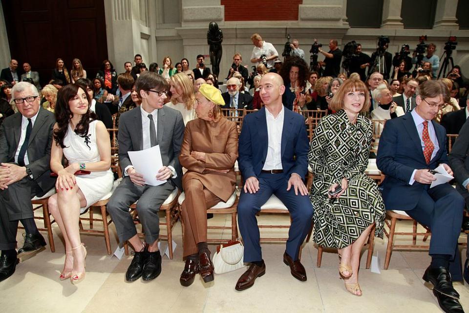 NEW YORK, NY - MAY 07: (L-R) Prada Chairman & CEO Patrizio Bertelli, Ms Beaudoin, curator Andrew Bolton, designer Miuccia Prada, Amazon Founder & CEO Jeff Bezos, Vogue Editor-in-Chief Anna Wintour and The Metropolitan Museum of Art Director Thomas P. Campbell attend "Schiaparelli and Prada: Impossible Conversations" Costume Institute exhibition press preview at The Metropolitan Museum of Art on May 7, 2012 in New York City.  (Photo by Charles Eshelman/FilmMagic)