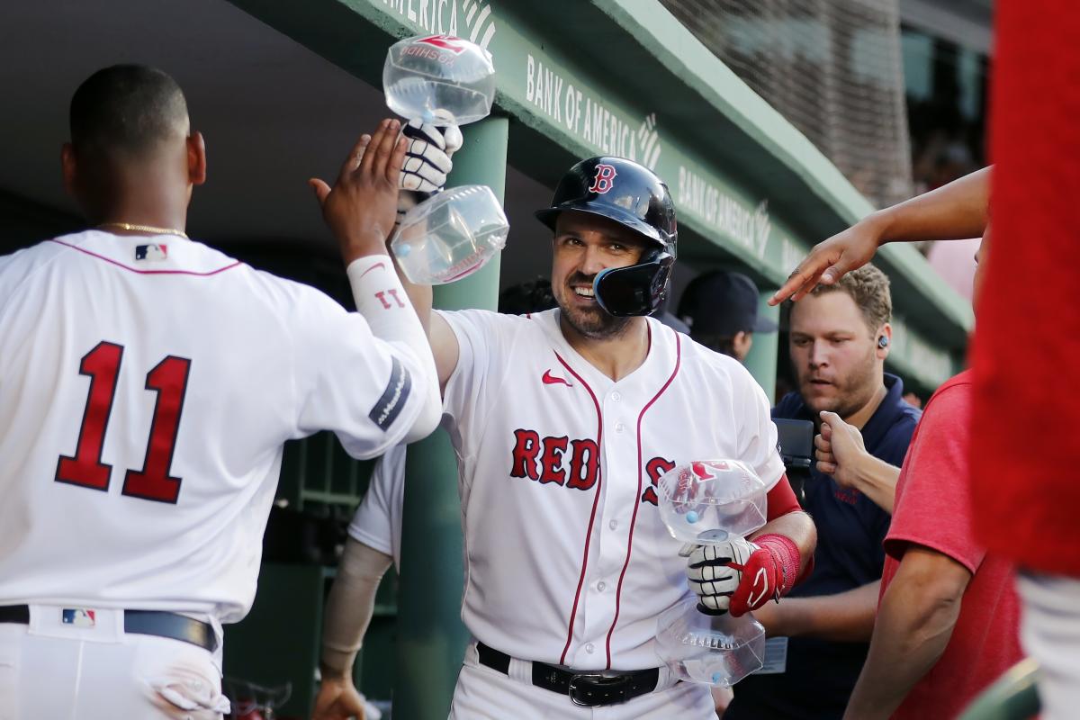 Boston Red Sox's Adam Duvall watches the flight of his home run in the  sixth inning of a baseball game against the Chicago White Sox, Sunday,  Sept. 24, 2023, in Boston. (AP