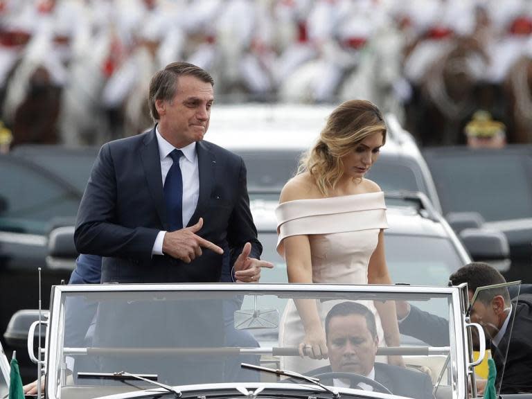 Brazilian president Jair Bolsonaro has announced his government is preparing new laws to make it easier to carry guns in public.The far-right leader said his plans would benefit “collectors, shooters and hunters” and expand the legal protection for people using firearms to defend their own lives or property. Mr Bolsonaro promised during his election campaign to overturn Brazil’s strict firearms laws, despite the country’s high murder rate.He argued that guns will help people defend themselves. “You can be sure the bums will think twice before committing a crime, knowing that someone might be armed," he said. He took the first step by signing a decree easing restrictions on civilians buying guns in January. It allowed Brazilians to keep up to four guns in their homes or places of business.During an internet broadcast earlier this week, Mr Bolsonaro revealed he had discussed the new legislation with the Ministry of Defence, according to a report in the Estadao newspaper.He said: “We will have news. That’s what you want. What we want is to treat collectors, shooters and hunters with the due respect they deserve.”The president said that in cases of invasion of a home or a farm, “the owner can defend himself by firing, and if the other side resolve to die is his problem.”He added: “Private property is sacred in Italy, and it has to be in Brazil as well.”No further details were provided about the planned legislation.Mr Bolsonaro, whose trademark gesture was his fingers pointing two imaginary guns, portrayed himself as a tough-on-crime candidate during the election campaign.Brazil recorded 64,000 murders in 2017, with with 43,000 of those the result of firearms. About 330,000 civilians in Brazil were legally registered to have a gun during the same year.Additional reporting by Associated Press