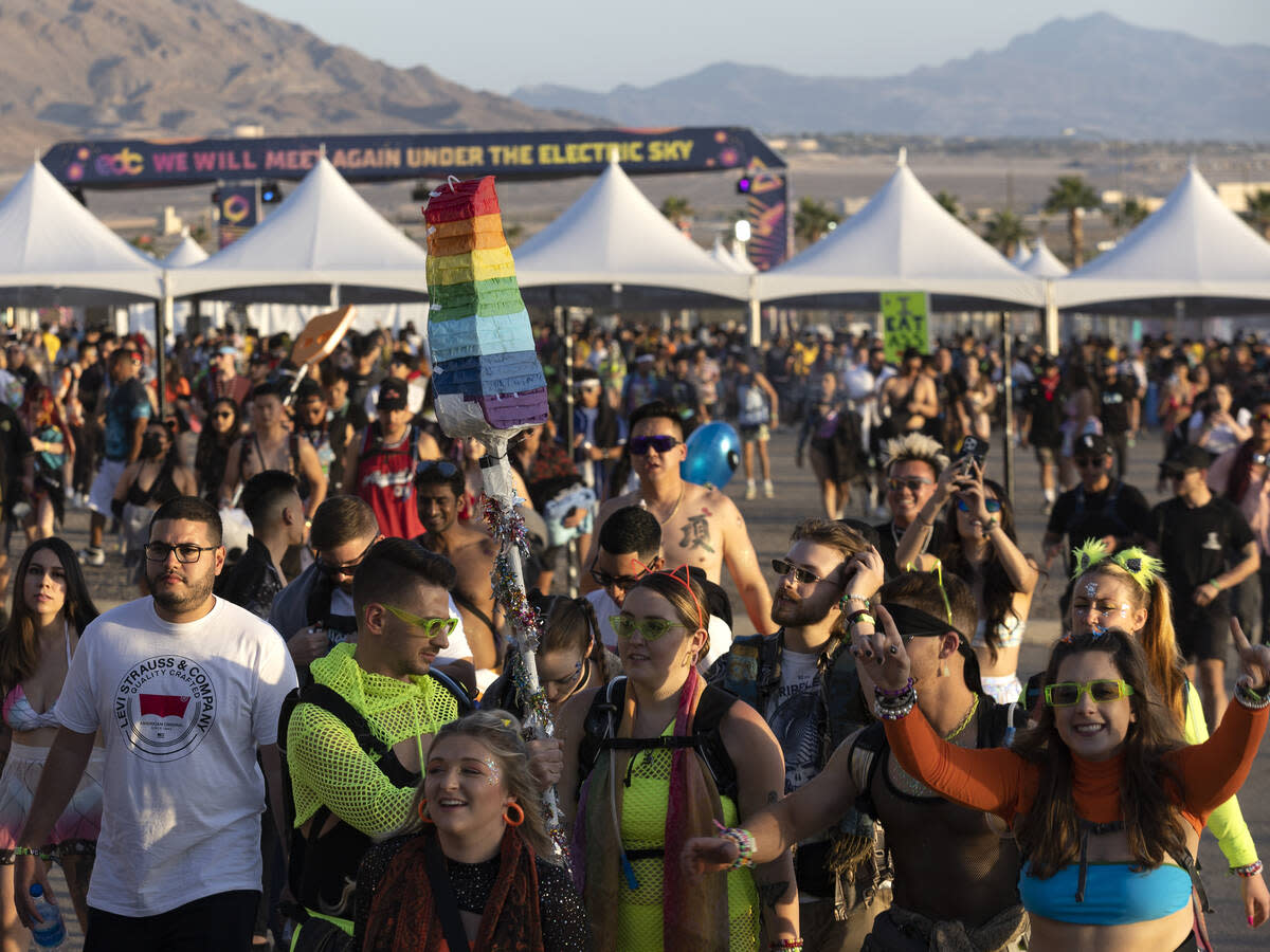 Attendees enter the Las Vegas Motor Speedway for the second day of the Electric Daisy Carnival on Saturday, May 21, 2022, in Las Vegas. The event is happening again this weekend