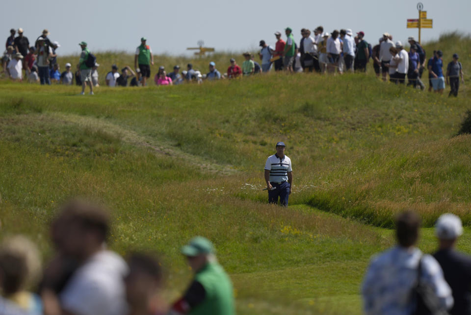 United States' Bryson DeChambeau makes this way along the 8th fairway to the green during the third round of the British Open Golf Championship at Royal St George's golf course Sandwich, England, Saturday, July 17, 2021. (AP Photo/Alastair Grant)