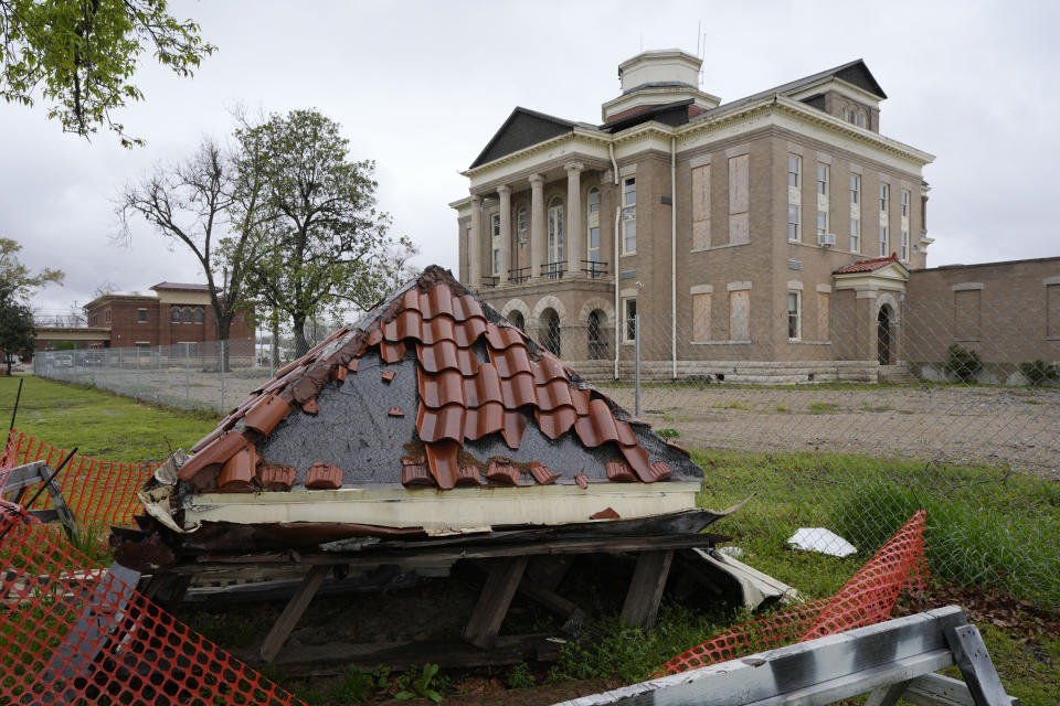 The Sharkey County Courthouse remains boarded up on March 22, 2024, one year after a devastating tornado struck in Rolling Fork, Miss. The city’s infrastructure suffered millions of dollars in damage. Public buildings, streets and the city’s sewer and drainage systems either sustained severe damage or were destroyed.(AP Photo/Rogelio V. Solis)
