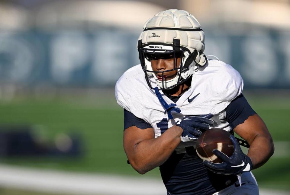 Penn State running back Kaytron Allen runs a drill during a spring practice on Tuesday, March 21, 2023.
