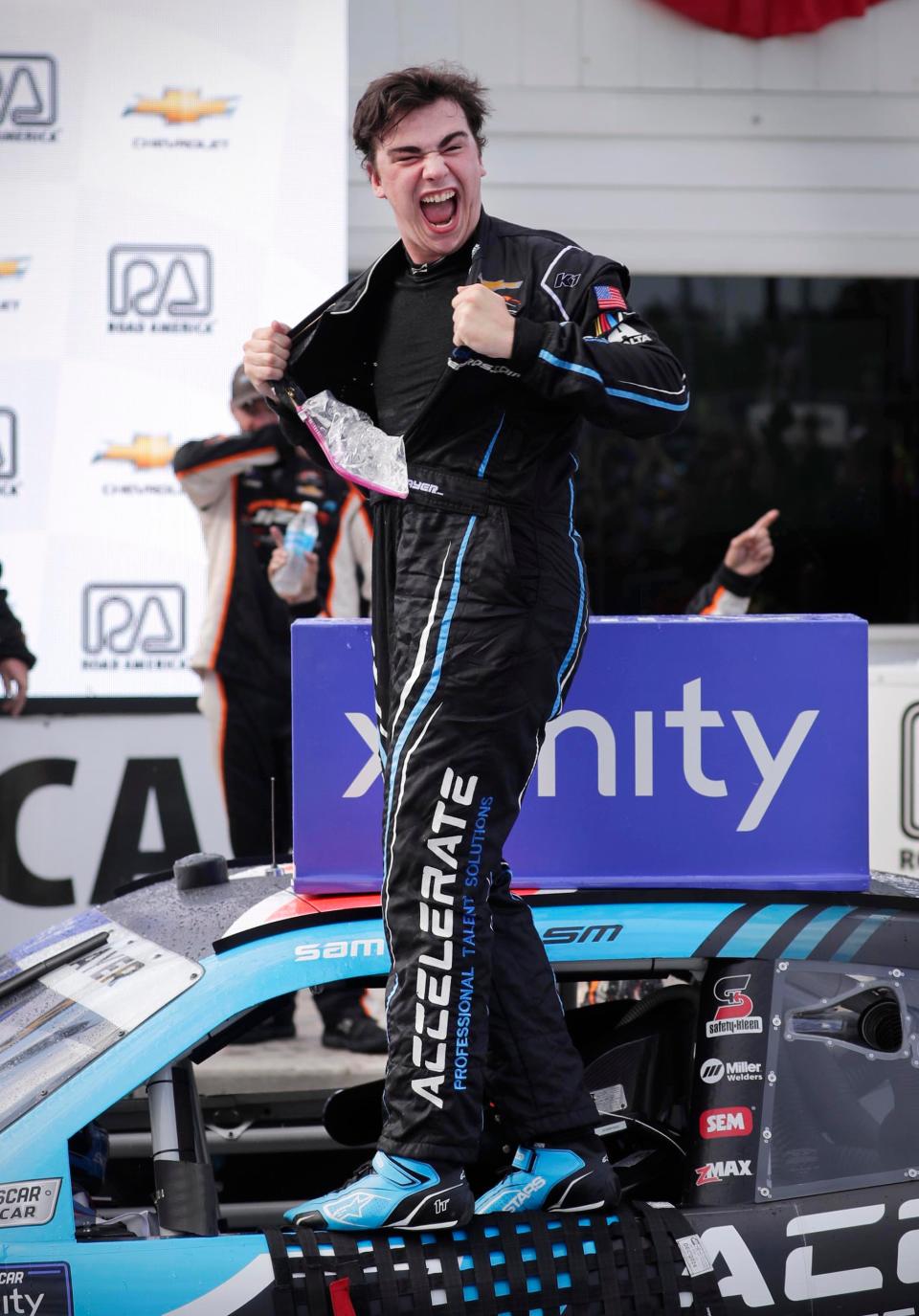 Winner Sam Mayer reacts to winning his first race at the Road America 180, Saturday, July 29, 2023, near Plymouth, Wis.