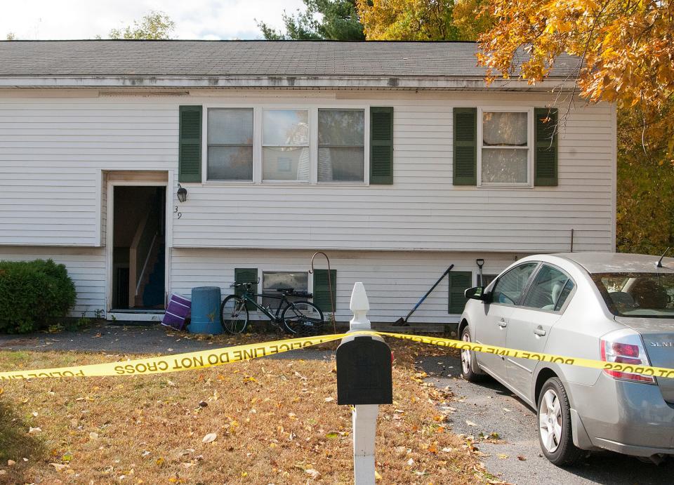 In a file photo, crime scene tape surrounds 39 Dixfield St. in Worcester on Oct. 18, 2019.