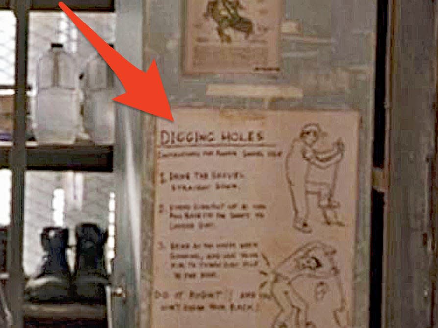 red arrow pointing at an instruction sheet for digging a hole in the camp green lake office in holes