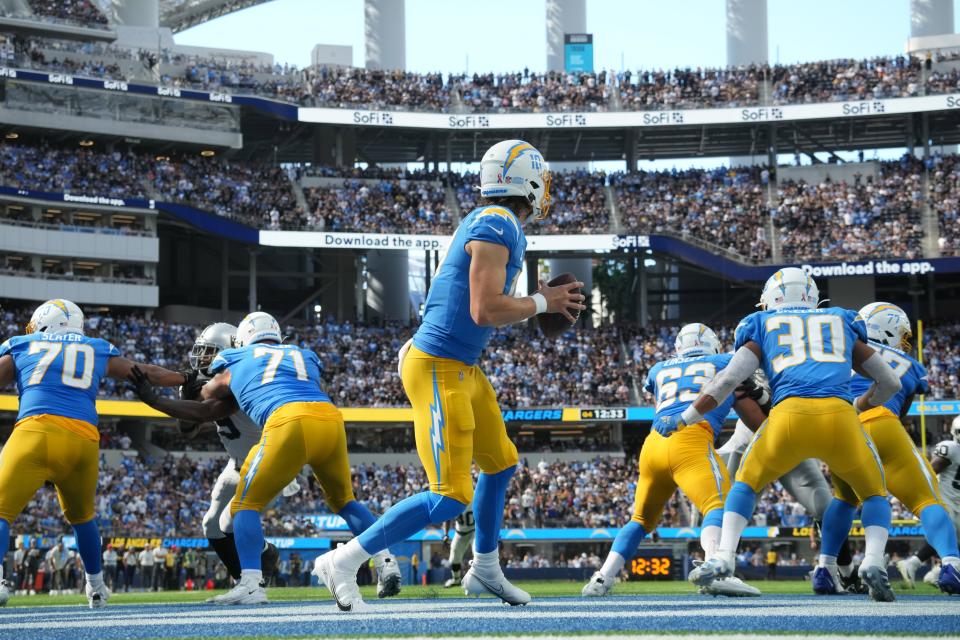 Sep 11, 2022; Inglewood, California, USA; Los Angeles Chargers quarterback Justin Herbert (10) drops back to pass against the Las Vegas Raiders in the second half at SoFi Stadium. Mandatory Credit: Kirby Lee-USA TODAY Sports