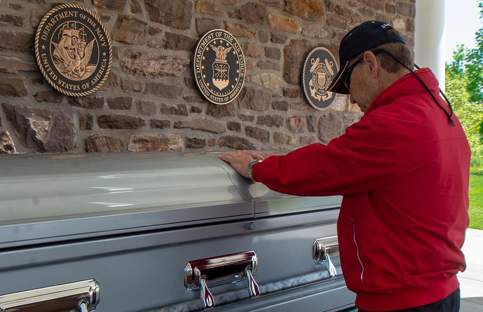 Joe Kowal, of Bristol Borough, pays his respects during the reinterment of the remains of WWII U.S. Army Pvt. Walter G. Wildman, of Bristol, Monday, May 23, 2022, at Washington Crossing National Cemetery, in Newtown. His family knew the Wildman family.