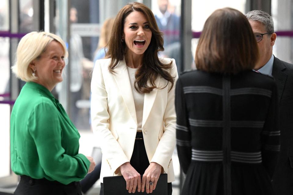 Catherine, Princess of Wales, is greeted by NatWest chief executive officer Alison Rose (L) upon her arrival at NatWest's headquarters in the City of London