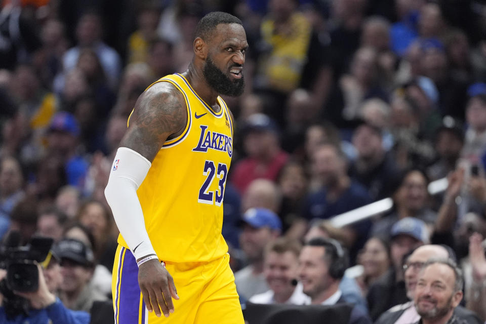 Los Angeles Lakers forward LeBron James scowls after scoring during the second half of an NBA basketball game against the Los Angeles Clippers Wednesday, Feb. 28, 2024, in Los Angeles. (AP Photo/Mark J. Terrill)