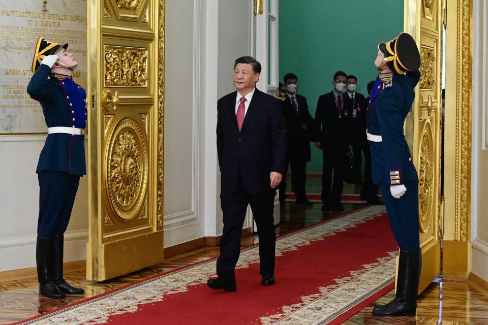 Chinese President Xi Jinping enters a hall to attend an official welcome ceremony with Russian President Vladimir Putin at The Grand Kremlin Palace, in Moscow, Russia, Tuesday, March 21, 2023. (Pavel Byrkin, Sputnik, Kremlin Pool Photo via AP)