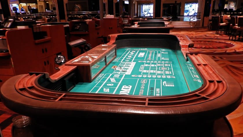 The conviviality and excitement of a crowd craps table will likely disappear when Caesars Palace reopens. State regulators will limit craps games to six players at each table.