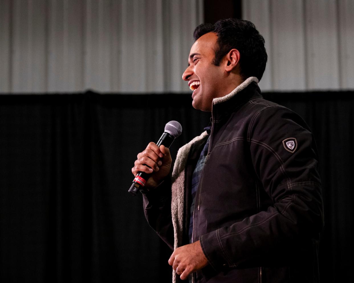 Republican presidential hopeful Vivek Ramaswamy speaks during U.S. Rep. Mariannette Miller-Meeks', R-Iowa, Triple MMM Tailgate event in Iowa City, Iowa on Friday, Oct. 20, 2023. The event featured remarks from several candidates for the Republican Party's nomination for President. (Nick Rohlman/The Gazette via AP)