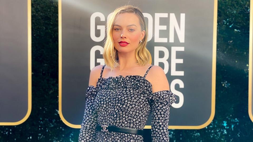 <p>Margot Robbie chose a Chanel for the occasion.</p>