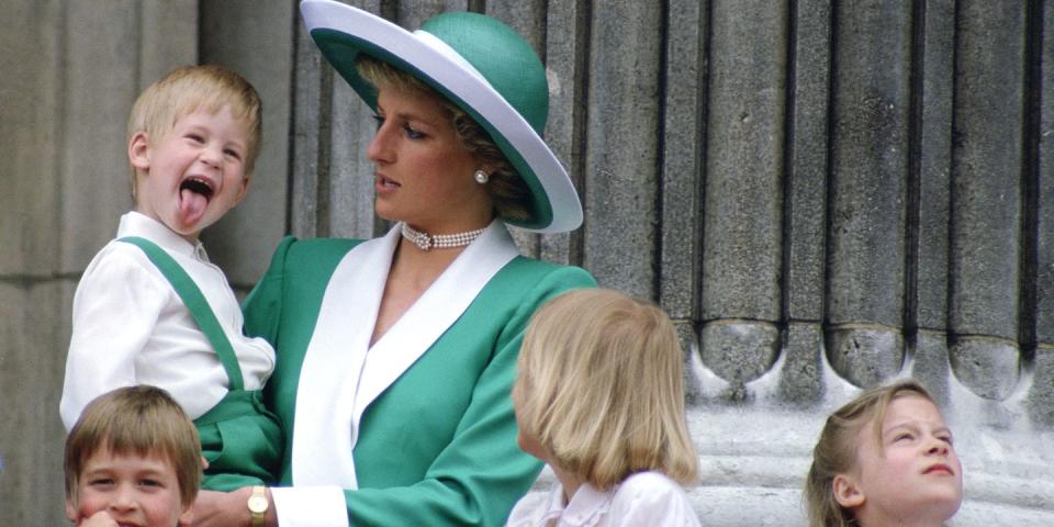 <p>The young royal sticks his tongue out while watching the annual Trooping the Colour from the balcony of Buckingham Palace.</p>