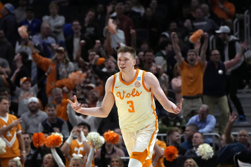 Tennessee guard Dalton Knecht (3) reacts after a three-point basket during the second half of a Sweet 16 college basketball game against Creighton in the NCAA Tournament, Saturday, March 30, 2024, in Detroit. (AP Photo/Paul Sancya)