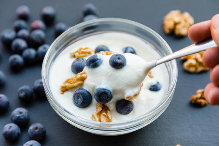 Men who regularly eat yoghurt could reduce their risk of developing pre-cancerous growths by a fifth, new research suggests.The study, conducted by the University of Washington, found that men who eat two or more servings of yoghurt a week had a significantly lower chance of developing adenoma – polyps in the bowel which may eventually become cancerous. After tracking more than 32,000 men for 25 years, the researchers found that those who consumed at least two portions of yoghurt a week had 19 per cent fewer adenoma growths.Furthermore, regular eaters were also 26 per cent less likely to have tumours of the most high-risk type. As the study was observational, the researchers said they were unable to ascertain why yoghurt could lower the risk of pre-cancerous growths.However, they did suggest that it could be due to two bacterias commonly found in live yoghurt – Lactobacillus bulgaricus and Streptococcus thermophilus.The researchers added that the dairy product's anti-inflammatory properties might also reduce gut leakiness – when undigested food particles, bacterial toxins and germs pass through the intestinal wall – and in turn protect against disease. Researcher Dr Yin Cao, from Washington University, said: “Our data provide novel evidence for the role of yoghurt in early stage of colorectal cancer development and the potential of gut bacteria in modulating this process.”The findings, if confirmed by future studies, suggest that yoghurt might serve as a widely acceptable modifiable factor, which could complement colorectal cancer screening and/or reduce risk of adenoma among the unscreened.“The study tracked a total of 32,606 men and 55,743 women, all of whom had a lower bowel endoscopy – a medical procedure which enables doctors to look at the inside of the gut using an instrument called an endoscope.Every four years, the participants provided information on their lifestyle and diet, including how much yoghurt they ate. During the study period, 5,811 pre-cancerous growths developed in the men, and 8,116 in the women.While men who ate yoghurt had a far lower risk of developing the growths, no association was seen in women.Katie Patrick, health information officer, from Cancer Research UK, said: “The colon is home to trillions of microbes and how the bacteria in our gut might affect bowel cancer risk is a fascinating area of research. Lots of things affect the types of bugs in our gut and our overall gut health, including the foods we eat.“But men don’t need to fill their shopping trolleys with yoghurt because it’s too early to say from this study whether eating more yoghurt could reduce the risk of bowel cancer. “However, there is good evidence that you can reduce your risk by eating more foods high in fibre, like wholegrain bread or brown rice, and cutting down on processed and red meat.”Bowel cancer is the fourth most common cancer in the UK, with more than 42,000 people diagnosed with the condition in the UK every year.This equates to around 115 new cases of bowel cancer every day.Symptoms of bowel cancer can include a change in your bowel habits, blood in stool, weight loss, pain in your abdomen or back, fatigue and feeling as though you need to strain your back package, even after going to the toilet, Cancer Research UK outlines.However, the NHS adds that experiencing symptoms associated with bowel cancer, such as abdominal discomfort and constipation, may not necessarily be indicative of bowel cancer.For more information on symptoms of bowel cancer, visit the NHS here and Cancer Research UK here.