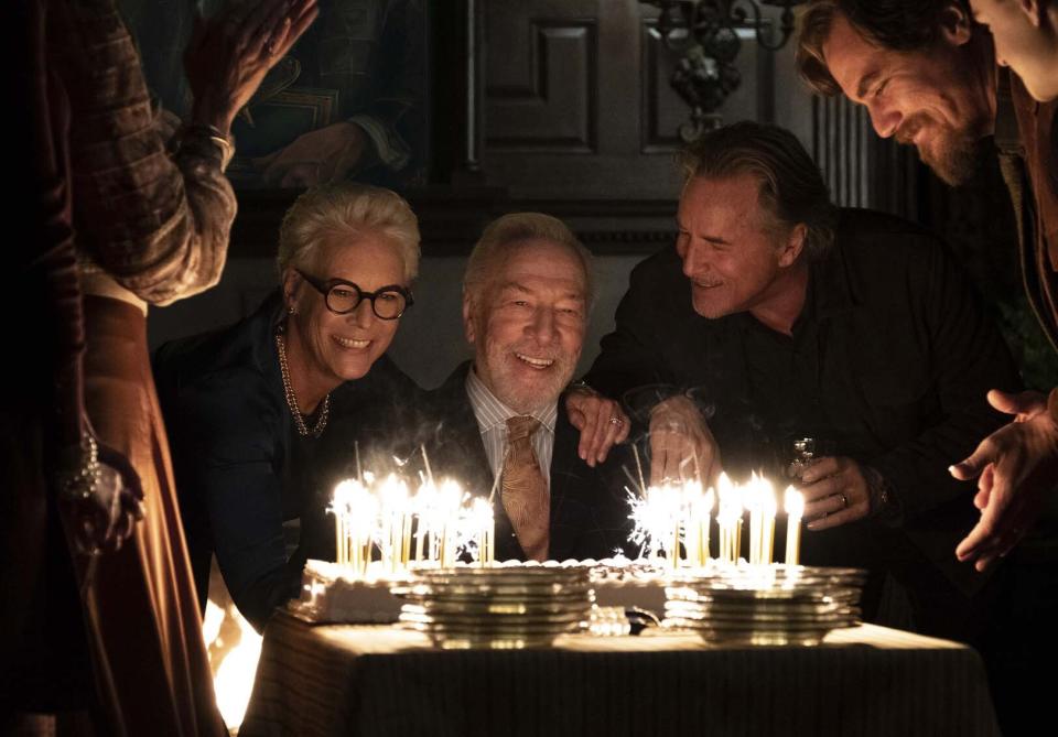 This image released by Lionsgate shows Jamie Lee Curtis, from left, Christopher Plummer, Don Johnson and Michael Shannon in a scene from "Knives Out." (Claire Folger/Lionsgate via AP)