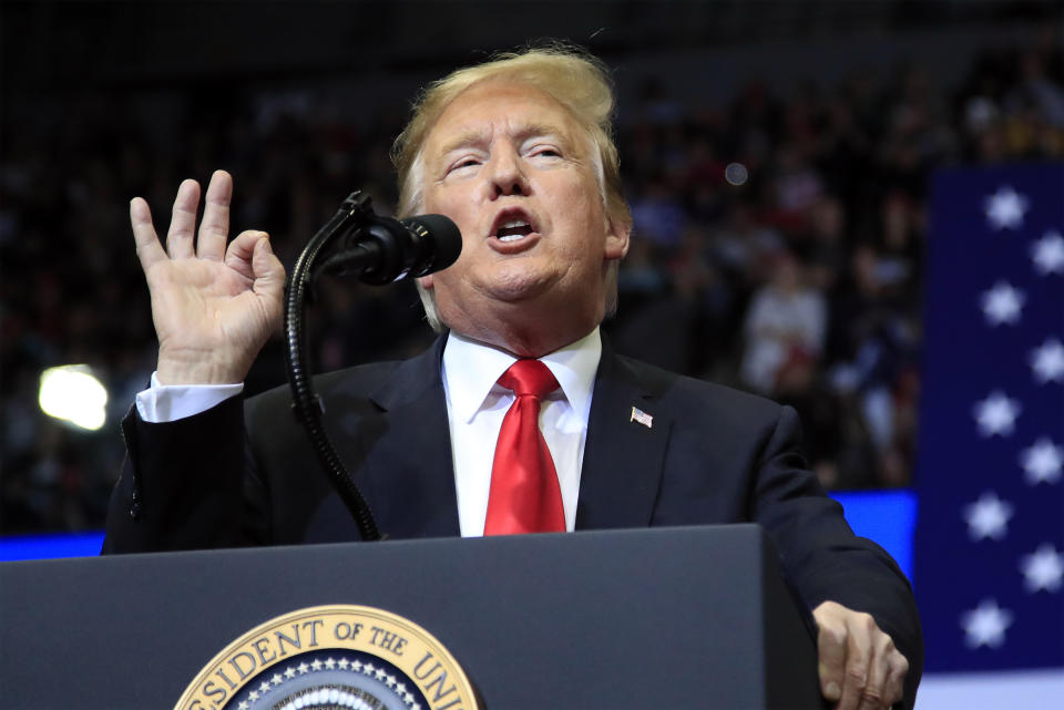 FILE - In this March 28, 2019 file photo, President Donald Trump speaks at a campaign rally in Grand Rapids, Mich. After losing in Congress, Trump is counting on the courts to kill off "Obamacare." But some cases are going against him, and time is not on his side as he tries to score a big win for his re-election campaign. Two federal judges in Washington, D.C., this past week blocked Trump's Medicaid work requirements and small business health plans. (AP Photo/Manuel Balce Ceneta, File)