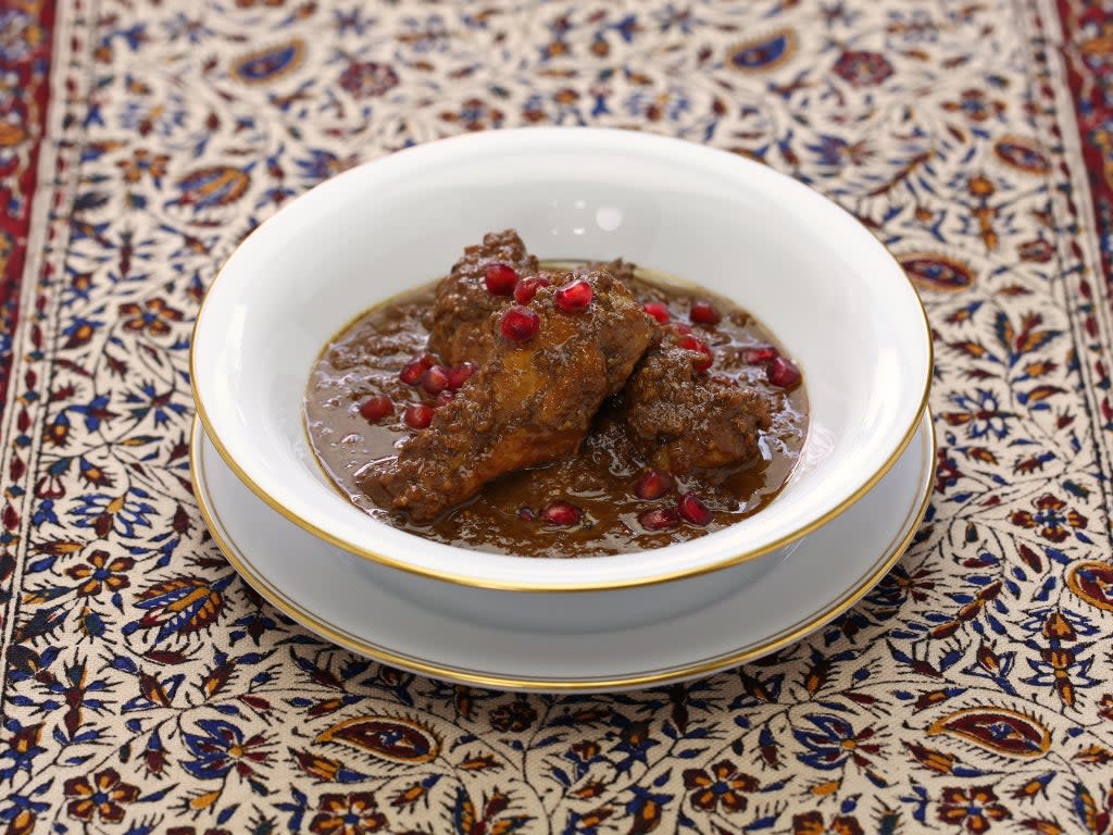 Khoresh morgh naardooni (pomegranate chicken stew), also called anar mosama, is a celebratory dish to serve on Yalda (Getty/iStock)