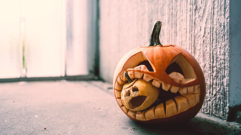 Close-Up Of Jack O Lantern On Window Sill During Halloween