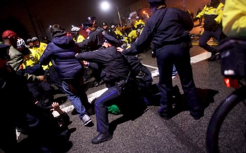 Police clash with fans celebrating the Philadelphia Superbowl LII victory over the New England Patriots - Credit: Reuters