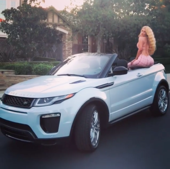 <p>Just a casual selfie sitting on the back of a Range Rover convertible.</p>