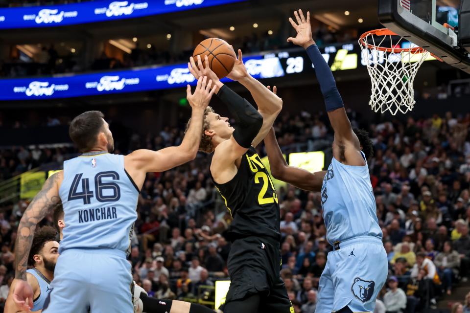 Utah Jazz forward Lauri Markkanen (23) goes to the hoop against Memphis Grizzlies forward Jaren Jackson Jr. (13) during the game at the Delta Center in Salt Lake City on Wednesday, Nov. 1, 2023. | Spenser Heaps, Deseret News