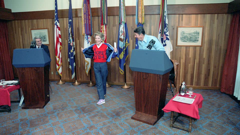 Nancy Reagan showing off her "4 more in '84" sweater during at Camp David, Maryland. - National Archives