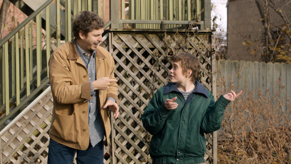 This image released by Variance Films shows Sophia Lillis, right, and Michael Cera in a scene from "The Adults." (Variance Films via AP)