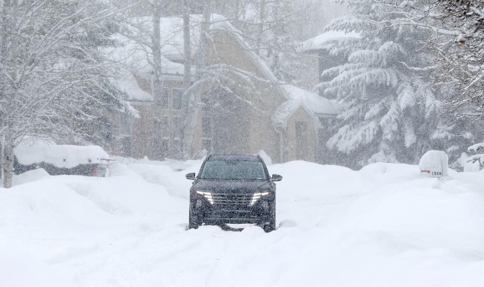 A driver navigates a snowy road during a snowstorm in Park City on Wednesday, Jan. 17, 2024. | Kristin Murphy, Deseret News