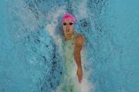 Regan Smith participates in the women's 100 backstroke during wave 2 of the U.S. Olympic Swim Trials on Tuesday, June 15, 2021, in Omaha, Neb. (AP Photo/Jeff Roberson)