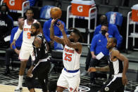 New York Knicks' Reggie Bullock (25) shoots against the Los Angeles Clippers during the second half of an NBA basketball game Sunday, May 9, 2021, in Los Angeles. (AP Photo/Marcio Jose Sanchez)