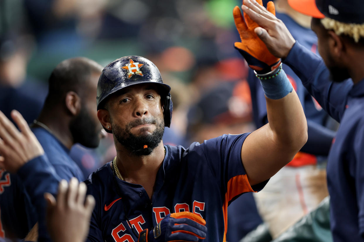 HOUSTON, TEXAS - JUNE 01: Jose Abreu #79 of the Houston Astros is congratulated by teammates in the dugout after a solo home run in the second inning against the Minnesota Twins at Minute Maid Park on June 01, 2024 in Houston, Texas. (Photo by Tim Warner/Getty Images)