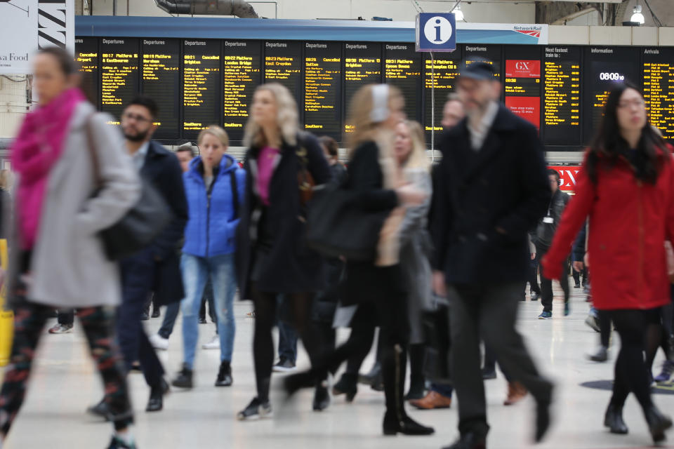 Commuters arrive at Victoria station on their way to work in central London on March 23, 2017. Seven people have been arrested including in London and Birmingham over Wednesday's terror attack at the British parliament, the police said today, revising down the number of victims to three people. / AFP PHOTO / Daniel LEAL-OLIVAS        (Photo credit should read DANIEL LEAL-OLIVAS/AFP/Getty Images)