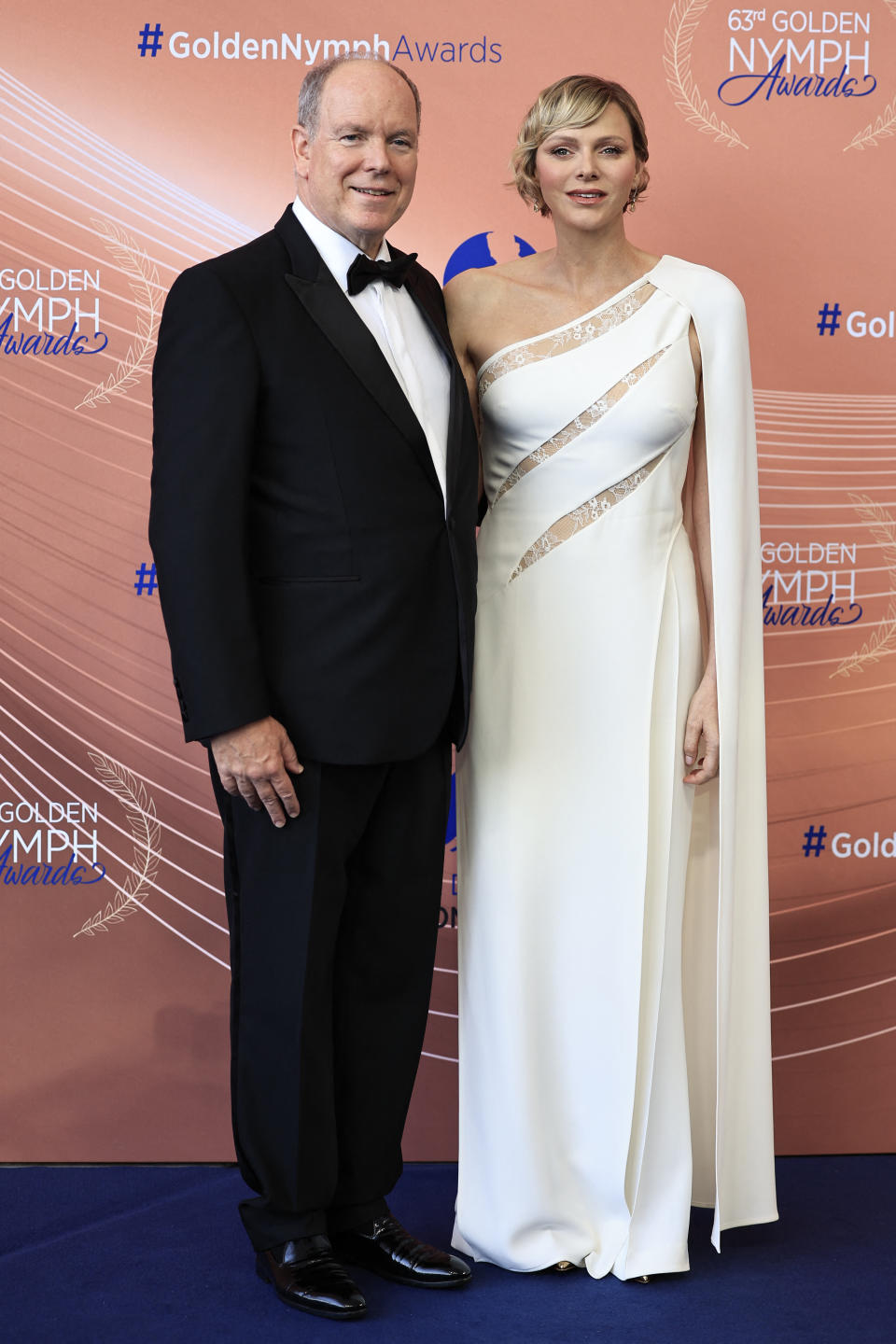Prince Albert II of Monaco (L) and Princess Charlene of Monaco (R) pose during the closing ceremony of the 63rd Monte-Carlo Television Festival in Monaco, on June 18, 2024. (Photo by Valery HACHE / AFP) (Photo by VALERY HACHE/AFP via Getty Images)