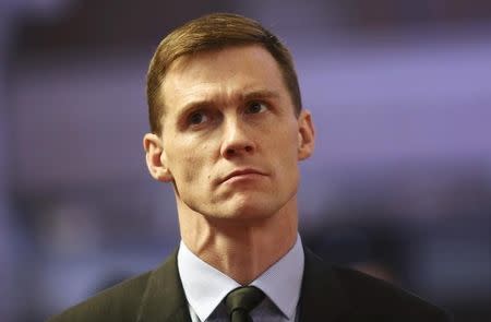 British Ambassador to Egypt John Casson attends Coptic mass prayers for the Egyptians beheaded in Libya, at Saint Mark's Coptic Orthodox Cathedral in Cairo, February 17, 2015. REUTERS/Mohamed Abd El Ghany