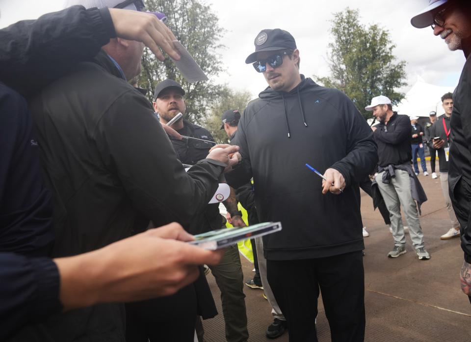 Country music singer/songwriter Hardy signs autographs for fans at TPC Scottsdale on Feb. 7, 2024.