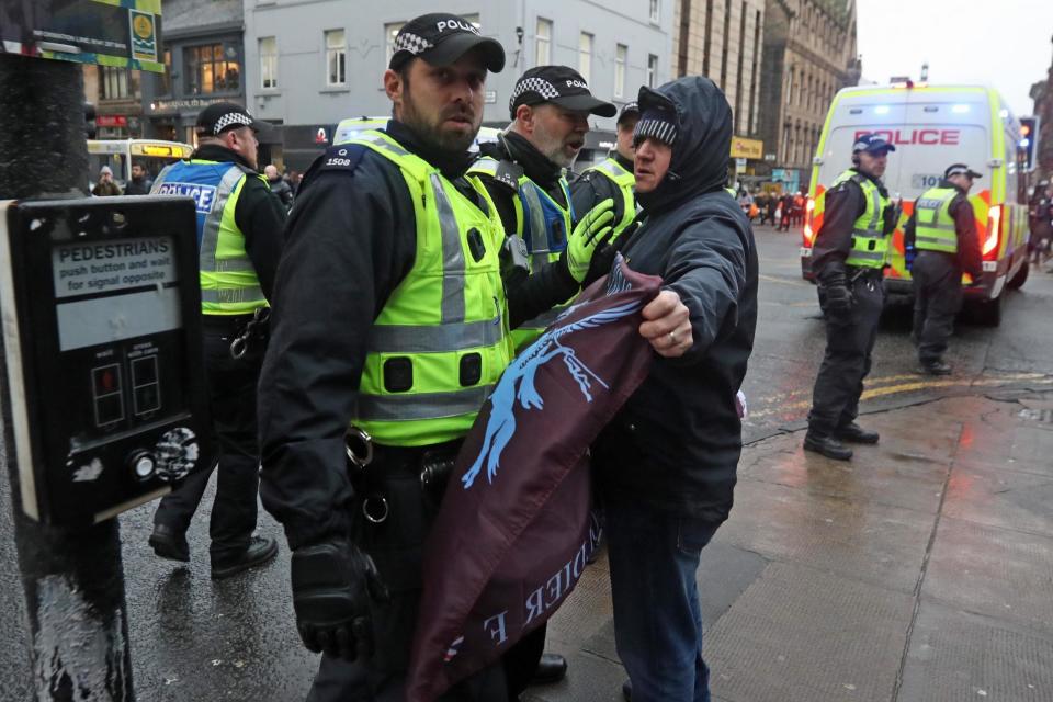 Police presence at the West of Scotland Band Alliance March for Justice in Glasgow (PA Wire/PA Images)