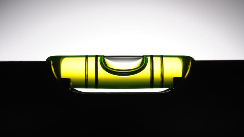 spirit level against white background