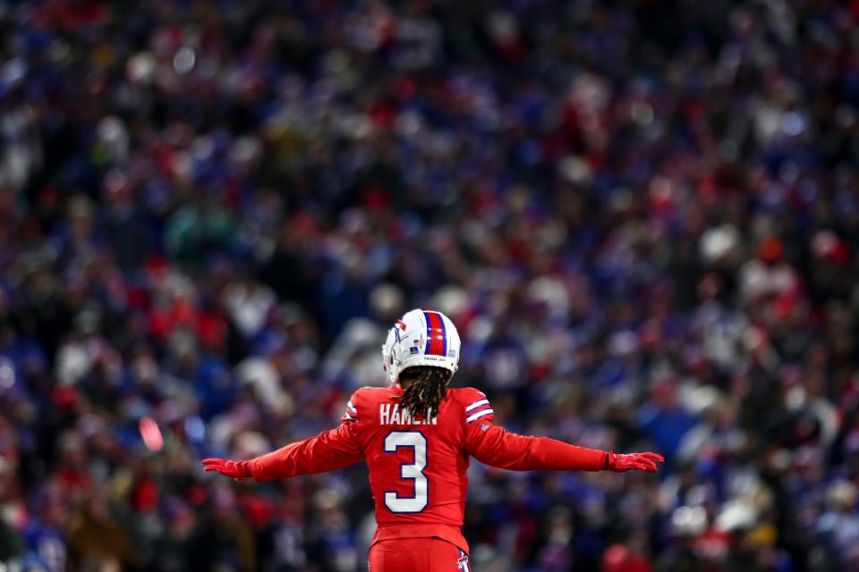 Damar Hamlin #3 of the Buffalo Bills celebrates after a play during the second quarter of an NFL football game against the Miami Dolphins at Highmark Stadium on December 17, 2022 in Orchard Park, New York