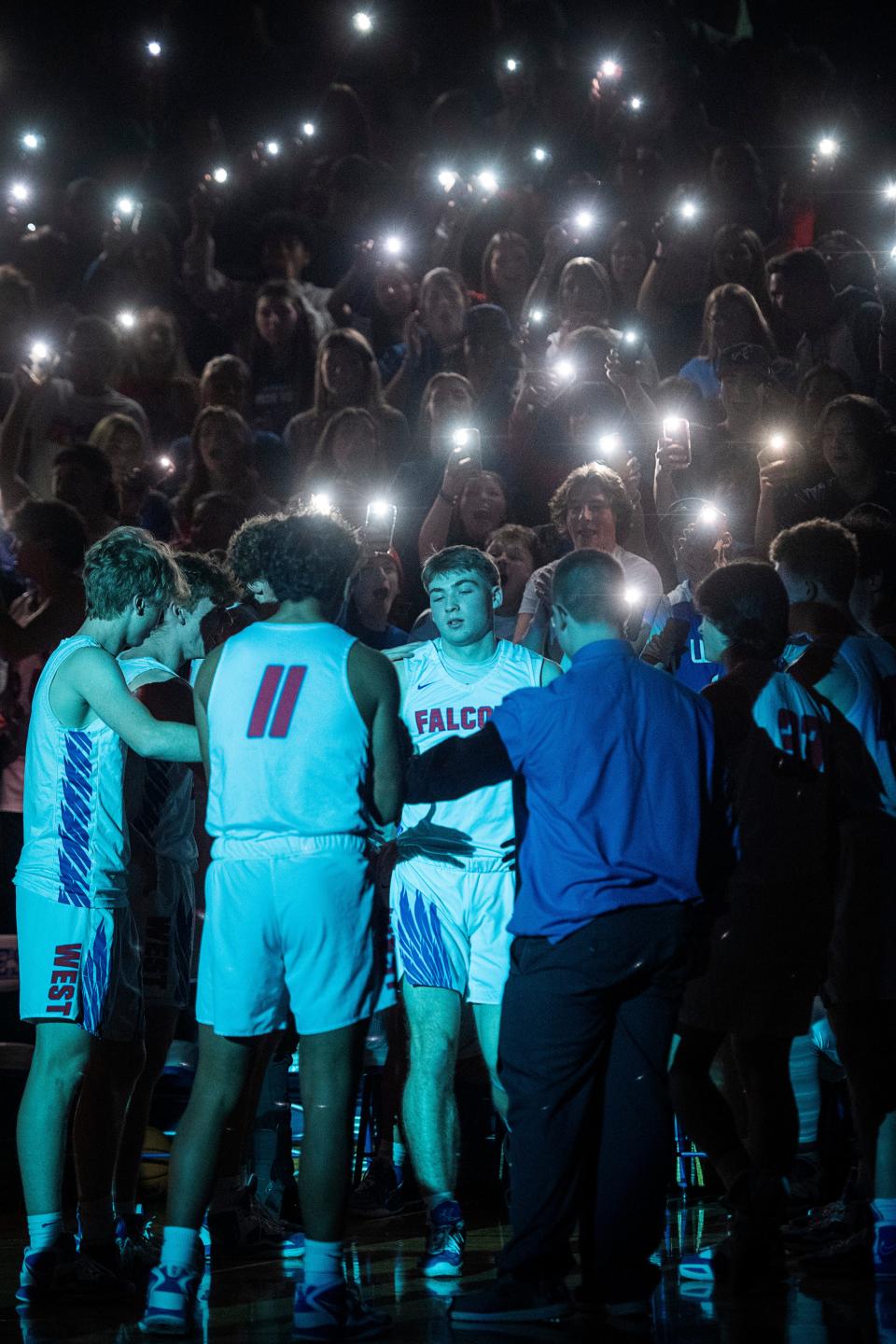 West Henderson’s Gavin Russell is announced in the starting lineup before the game against Franklin February 3, 2023. The Falcons won in overtime 68-62.
