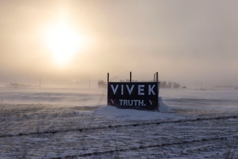 Snow piles around a campaign sign for Republican presidential candidate and businessman Vivek Ramaswamy, in Iowa