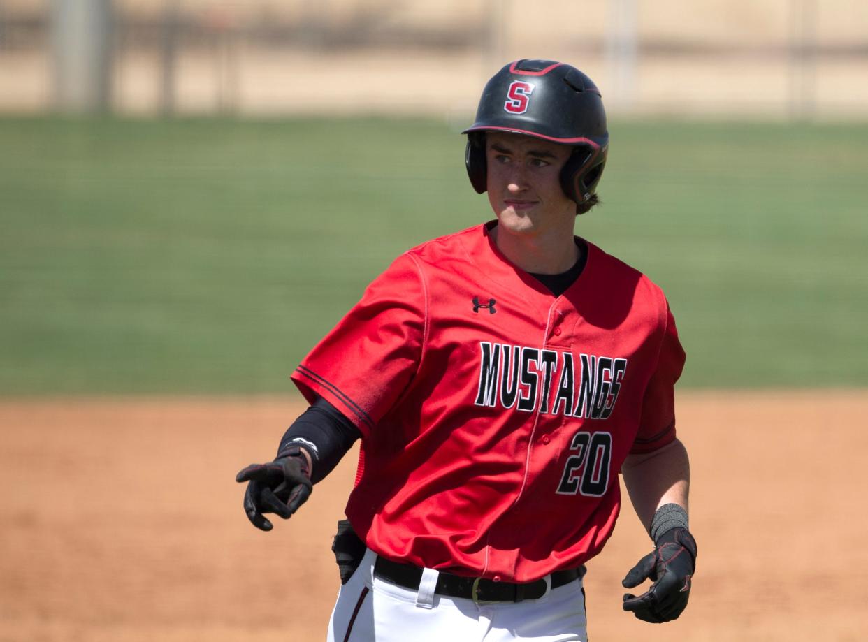 Shallowater's Kohle Kerin (20) gestures to the Abernathy fan section before being ejected for throwing a bat before his home run, Saturday, April 9, 2022, in Abernathy. Shallowater won, 23-5, in five innings.