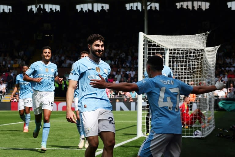 Le défenseur croate de Manchester City Josko Gvardiol (c) auteur d'un doublé à Londres, le 11 mai 2024 (Adrian DENNIS)