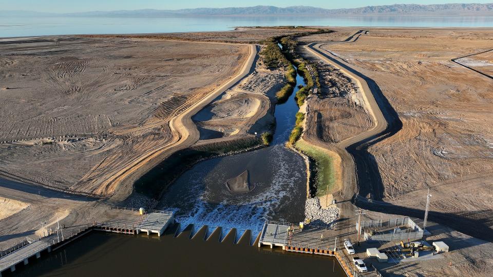 The New River diversion structure is pictured in the Species Conservation Habitat Project by the Salton Sea in Imperial County, Calif., on Wednesday, Dec. 13, 2023. The structure will divert New River water to basins where it can be mixed with water pumped from the Salton Sea, enabling control over salinity concentrations in the habitat’s ponds. The Species Conservation Habitat Project will turn over 4,000 acres of exposed lake bed into wetlands habitat for aquatic wildlife and migratory birds of the Pacific Flyway, as part of a 10-year plan to restore 30,000 acres around the Salton Sea. | Kristin Murphy, Deseret News