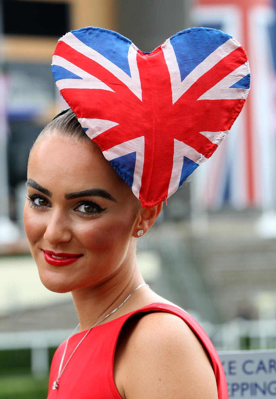 A racegoer attends Ladies Day during Royal Ascot at Ascot Racecourse on June 21, 2012 in Ascot, England. (Photo by Danny Martindale/Getty Images)